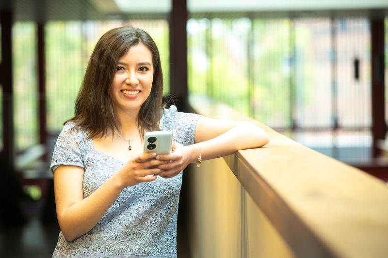 female student on phone